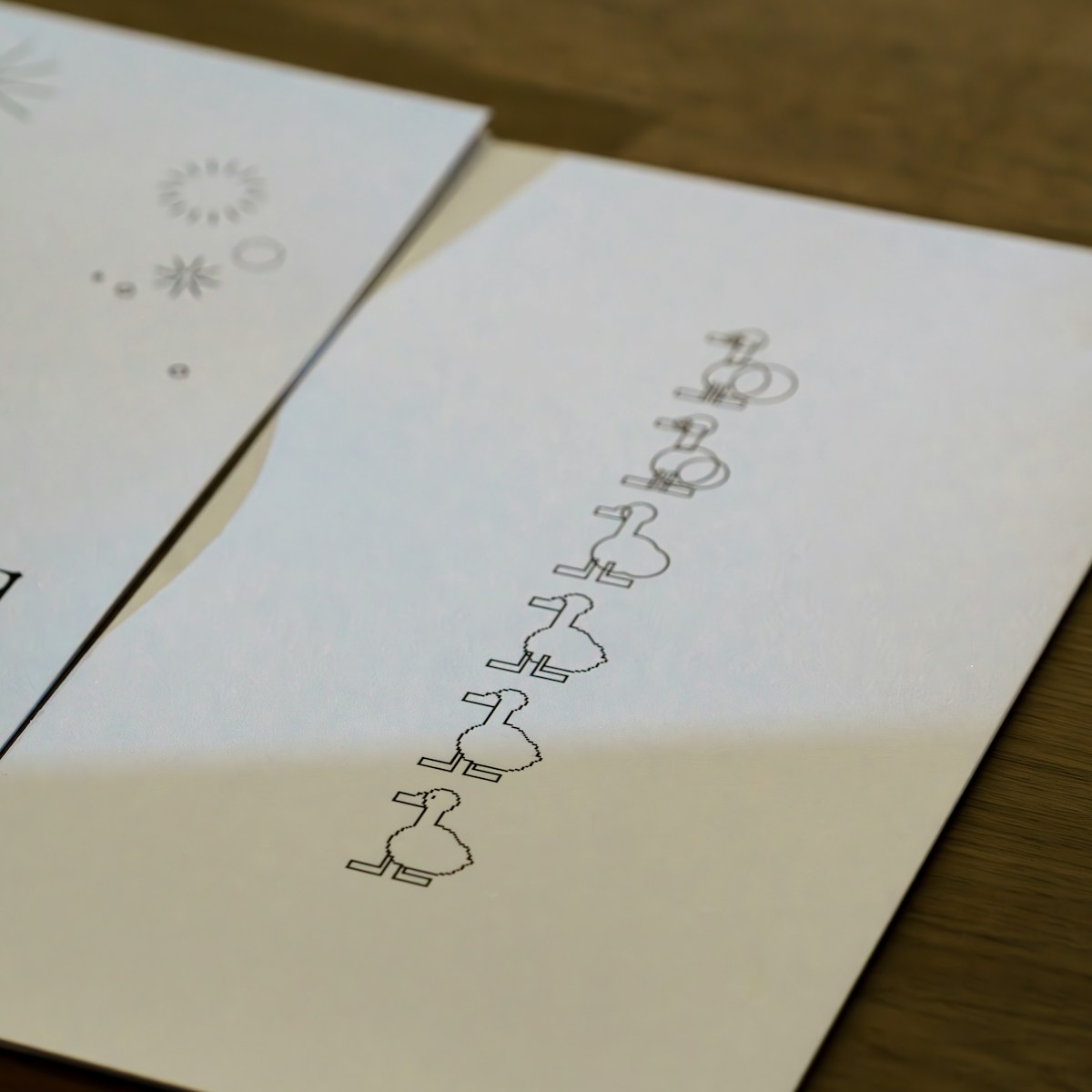A close up of two envelopes on a table